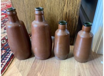 Lot Of 4 Painted Brown Bottles