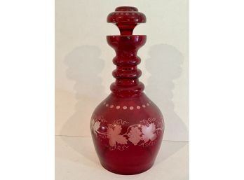 A Fun Vintage Red Glass Decanter With Etched  Grape Leaf Design
