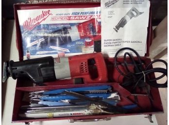 Fantastic Milwaukee Brand Sawzall With Lots Of Blades Along With Metal Tote Box. B4