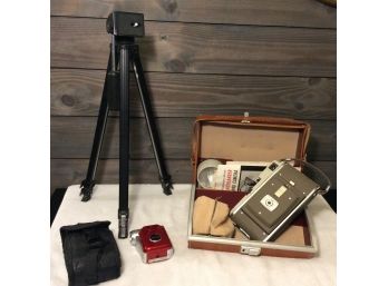 Assortment Of Cameras And Camera Equipment - L