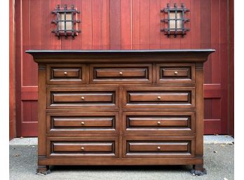 (9) Drawer Chest With Wide Fluted Side Panels And Raised And Inset Drawer Faces In A Chestnut Color*