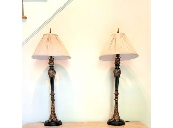 Pair Of Black And Gold Toned Lamps