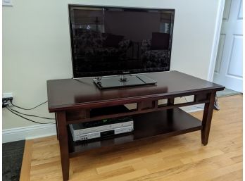 TV Stand Thats Part Of A Larger Set
