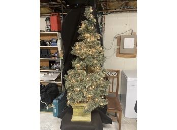 Small Fake Lighted Christmas Tree In Stand
