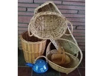 Wicker Baskets And More Wicker Baskets Plus A Teapot With A Wicker Handle