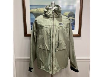 A Green Patagonia Zip Up Anorak With Large Front Pockets And Zip Away Hood - XL