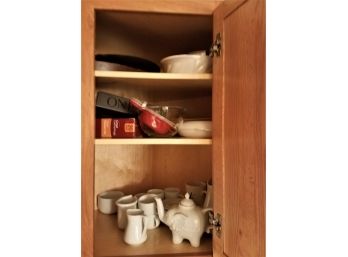 Kitchen Cabinet LOT #1: White Mugs. Elephant Teapot. Etc. (Lot 117)