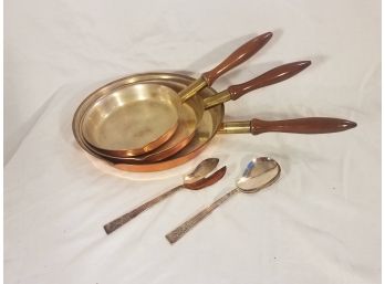 Set Of 3 Copper Fry Pans With Wooden Handles And Silver Serving Spoons (Lot 076)