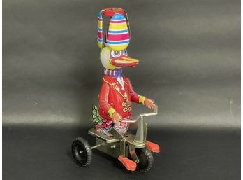 Vintage Schylling Wind-Up Toy: Duck On Bike