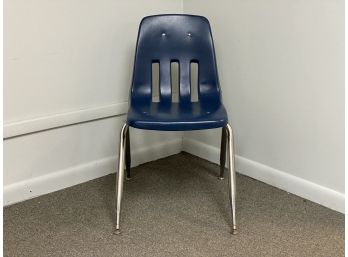 A School Chair In Blue Molded Plastic & Chrome By Virco