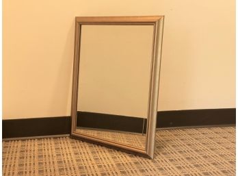 A Simple Wall Mirror In A Gilt Wood Frame
