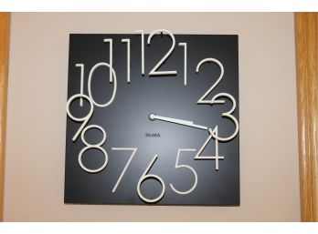 Mid Century Modern Black Wall Clock With White Raised Numbers From MoMA