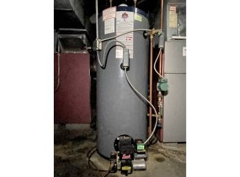 A Bock 50 Gal, Oil Fired Hot Water Heater With Taco Pump And Carlin Burner