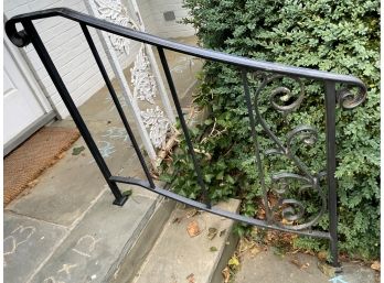 A Pair Of Wrought Iron Railings At Front Entrance
