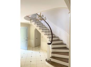 A 31' Wooden Grand Entry Stair Railing