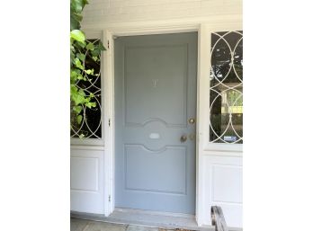 A 2' Thick Front Door With Decorative Metal And Glass Sidelights, Heavy Brass Hardware