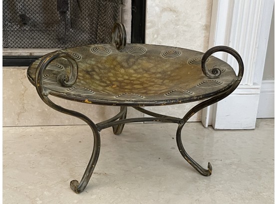 A Decorative Piece With Metal Stand