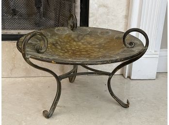 A Decorative Piece With Metal Stand