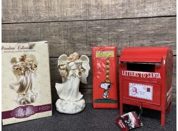 A Holiday Lot Including A Porcelain Classic Treasures Musical Angel