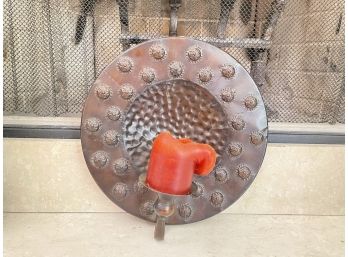 A Decorative Metal Wall Hanging Candle Holder