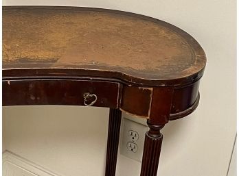 An Antique Table Desk With Embroidered Top