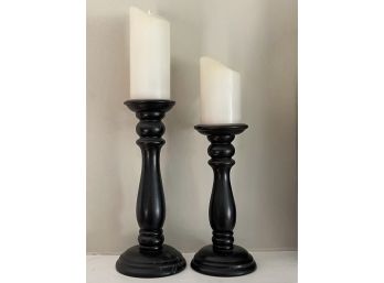 Some Faux Candles With Black Candlesticks