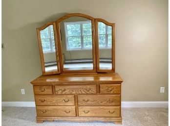 A Solid Oak Long Dresser With Mirror