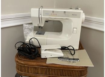 A Kenmore Sewing Machine In Original Box