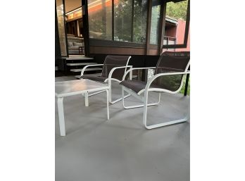 A Pair Of Brown Jordon Quantum Aluminum Frame And Sling Chairs With Cocktail Table