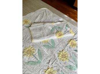 A Pair Of Twin Vintage Handcrafted Patchwork Quilts In Sunflowers On White Background