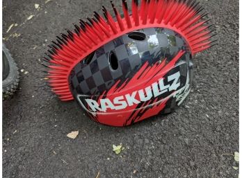 A Rasculls Bicycle Helmet With Mohawk