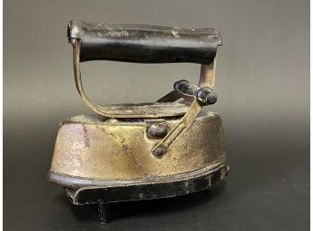 Antique Cast Iron Sad Iron On Base