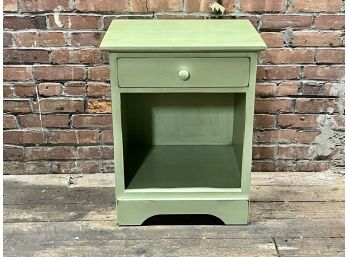 A Green Rustic End Table With Dovetail Joinery