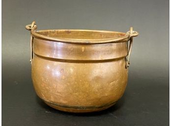 A Vintage Copper Cauldron With Handle