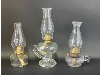 A Trio Of Oil Lamps