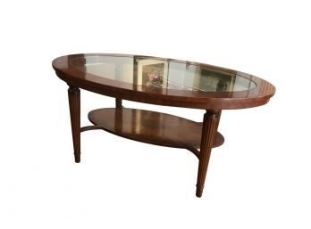 Oval Glass Topped Coffee Table With Shelf And Inlaid Wood Design - 48'L