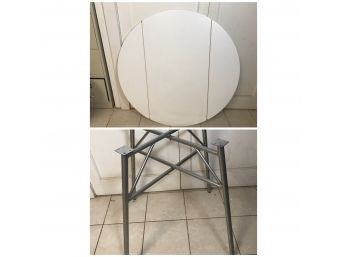 White Laminate Table Top And Aluminum Frame - 42'D With Drop Leaf Sides