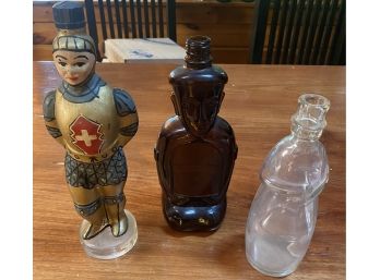 Three Figural Bottles