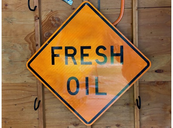 Decommissioned Fresh Oil Road Sign
