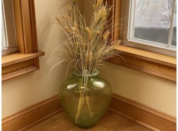 A Large Green Glass Vase & Wheat Stalks