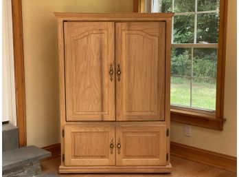 A Blonde Wood Entertainment Armoire