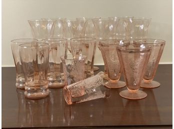 A Large Assortment Of Pink Depression Glassware
