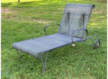 A Classic Metal Outdoor Chaise Lounge