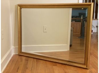 A Beautiful Beveled Mirror In A Gilt Frame