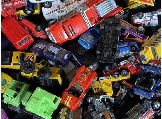 A Great Assortment Of Diecast & Plastic Cars