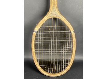 A Vintage Wooden Tennis Racquet