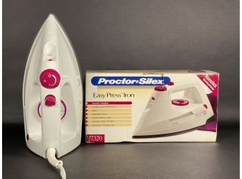 A Proctor-Silex Easy-Press Steam Iron