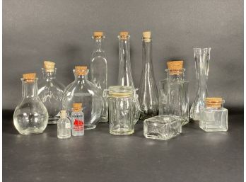 An Assortment Of Small Bottles With Cork Stoppers