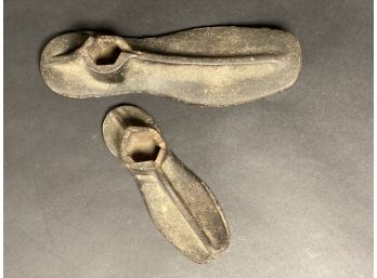 A Pair Of Vintage Cast-Iron Cobbler's Shoe Forms