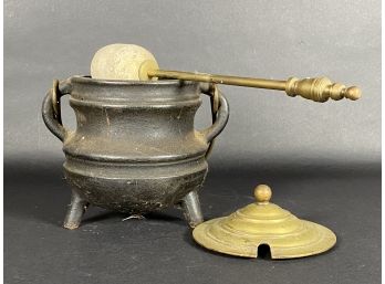 A Vintage Cast-Iron Fire Starter With Pumice Wand